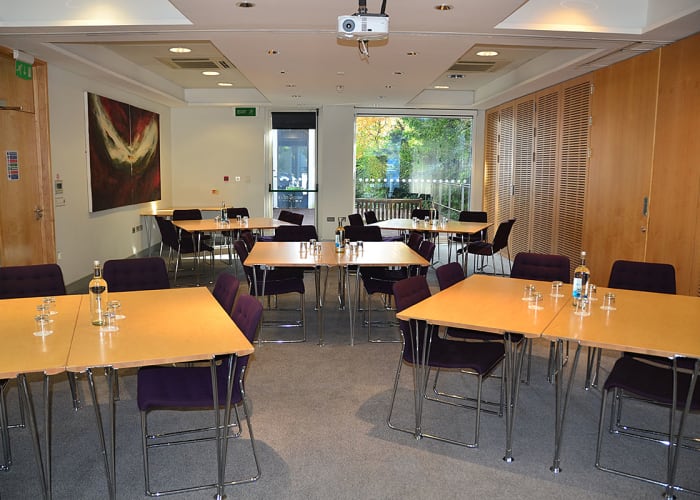 The air-conditioned Seminar Room can be set up in any style and leads straight off the main Foyer. The room has plenty of natural daylight and overlooks the decking area. A fixed HD data projector, screen and ceiling speakers come included with this room.