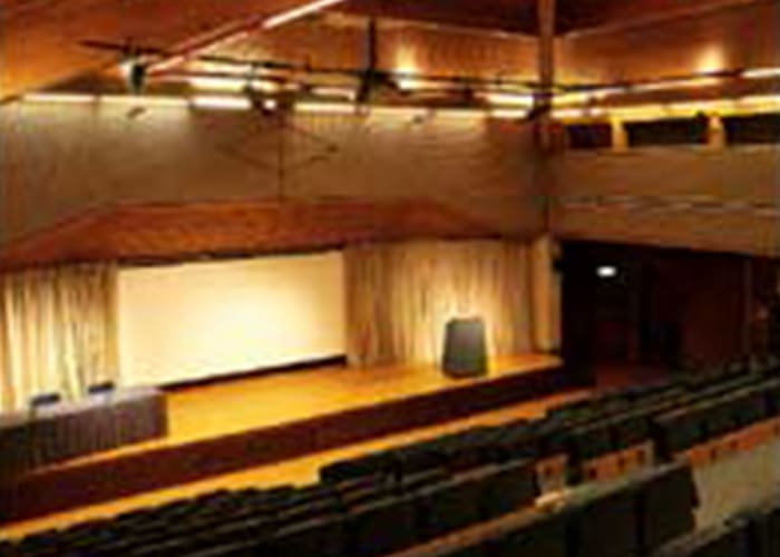 A modern, purpose-built auditorium seating up to 250 with full audio-visual equipment and large stage.