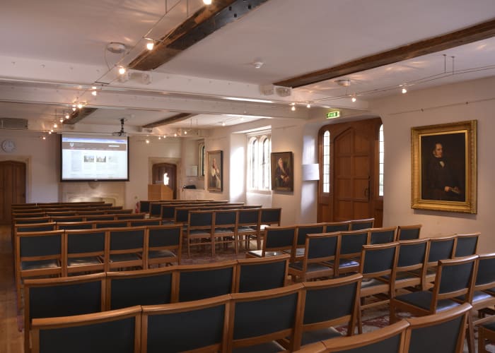 The Graham Storey Room, set theatre style, has large windows allowing plenty of natural daylight.