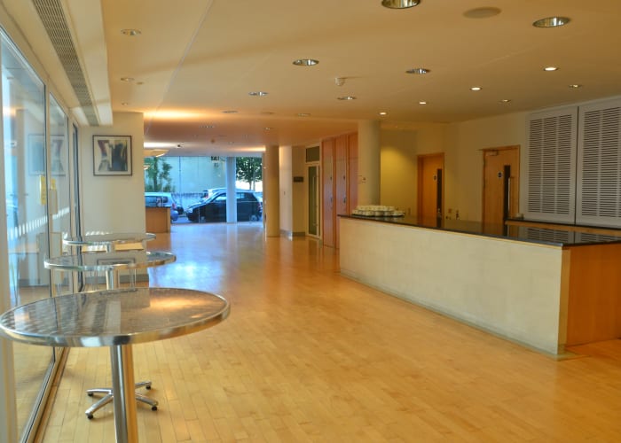 Buckingham House Foyer - Interior view showing reception desk and catering station.