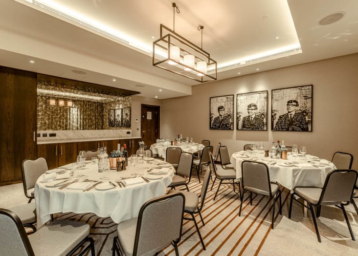 Set for dinner, the Hawking Suite is a modern event space ideal for intimate, private dining functions.