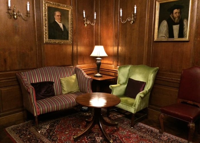 Two luxurious armchairs in a corner in the Chetwode Room.