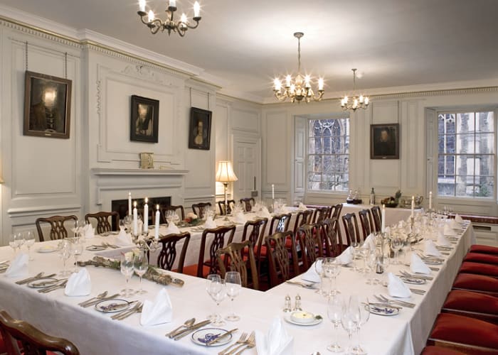 The Parker Room has chandeliers and a fire place, a lovely setting for intimate private dining.