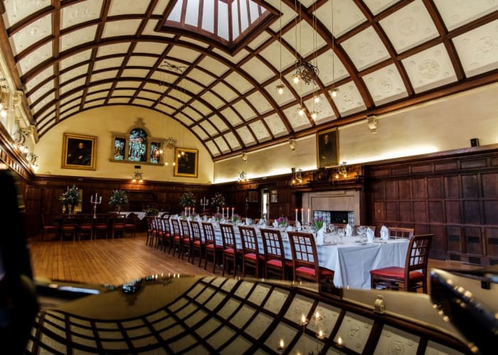 The beautiful dining hall, with oak-panelled walls, stained glass windows and cupola ceiling, it is a truly memorable event space in Cambridge.