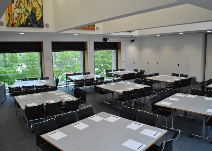 The entire first floor of the Gillespie Centre is occupied by the double-height Elton-Bowring Room with a folding, acoustic screen wall allowing the space to be divided into two seminar rooms. As one room, the Elton-Bowring Room can accommodate up to 150 delegates theatre-style, 96 cabaret-style, 72 classroom-style or 56 boardroom-style.