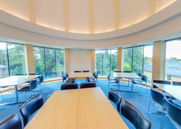 A conference room for hire, with floor to ceiling windows filling the room with natural light it is ideal for day meetings.