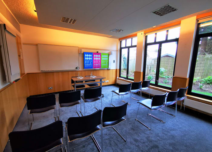 Classroom with theatre style layout with side windows for natural lighting