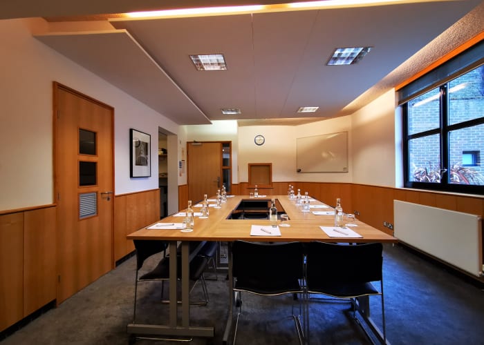 Seminar room with hollow square table layout