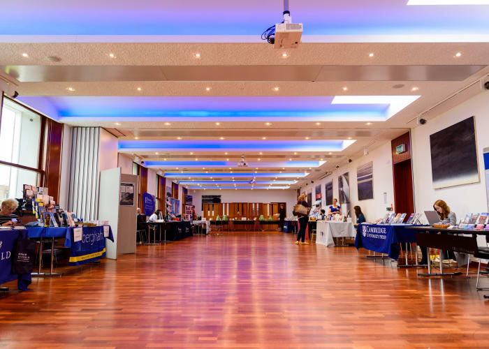 Located on the first floor overlooking the Fellows Lawn. A Modern style hall with ambient lighting with wooden flooring.