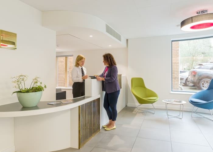 WYNG Gardens Reception area is a spacious and modern space filled with natural daylight from large windows.
