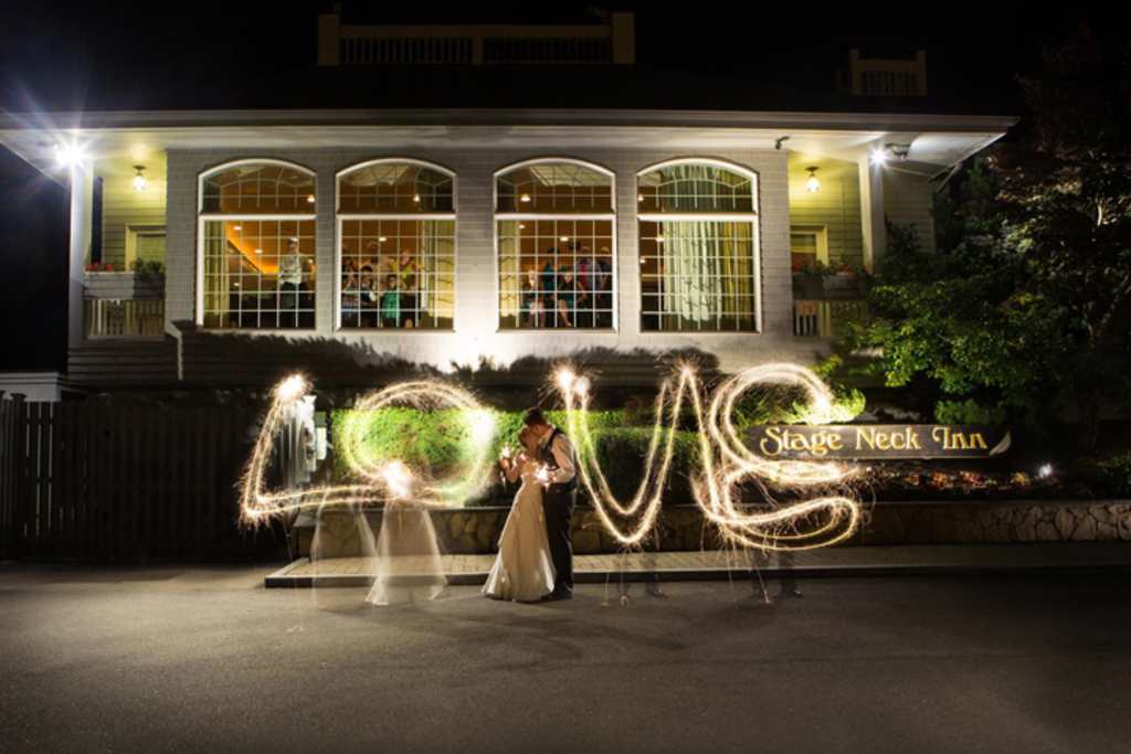 Wedding Couple with Sparklers. Photo Credit: Focus Photography