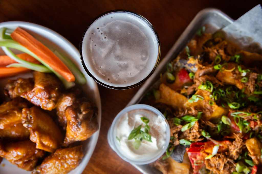 Wings and Nachos. Photo Credit: $3 Deweys