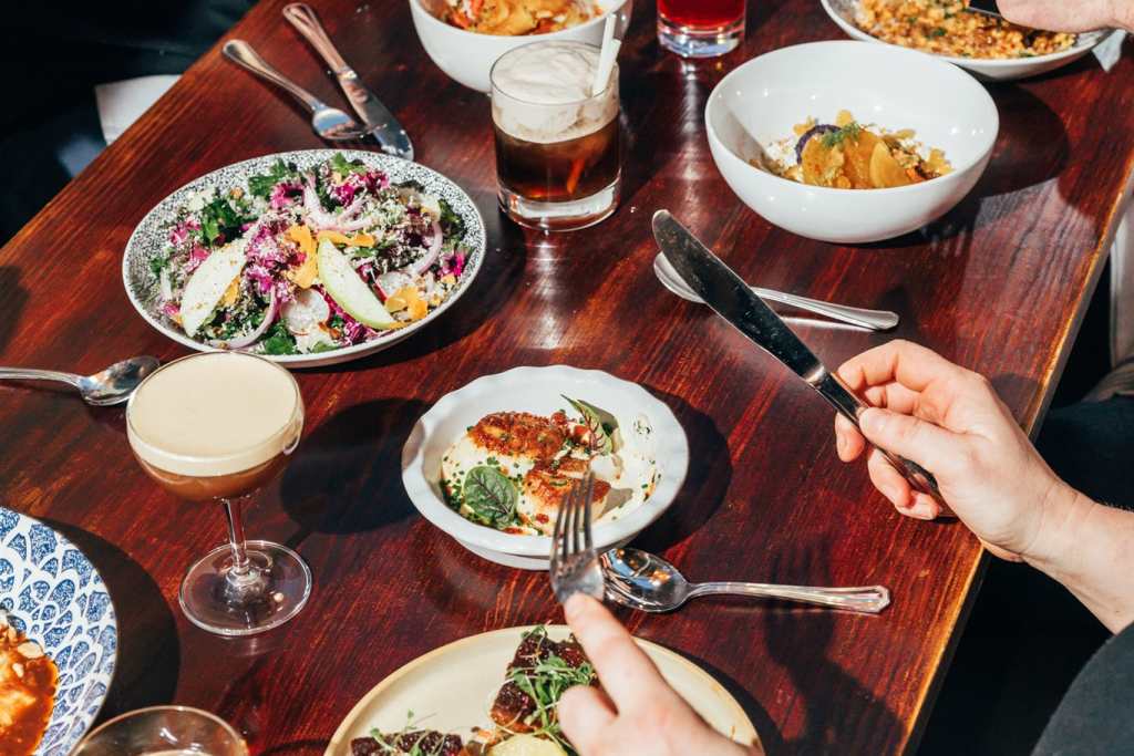 Dining at Sur Lie. Photo Credit: Dawson Renaud Photo and Film