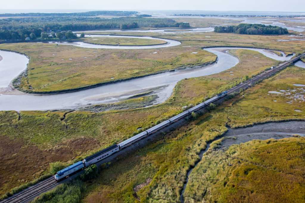 Amtrak through the marsh. Photo Credit: Dave Cleaveland Maine Imaging