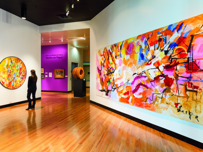 Person viewing an exhibit in the Leepa-Rattner Museum of Art