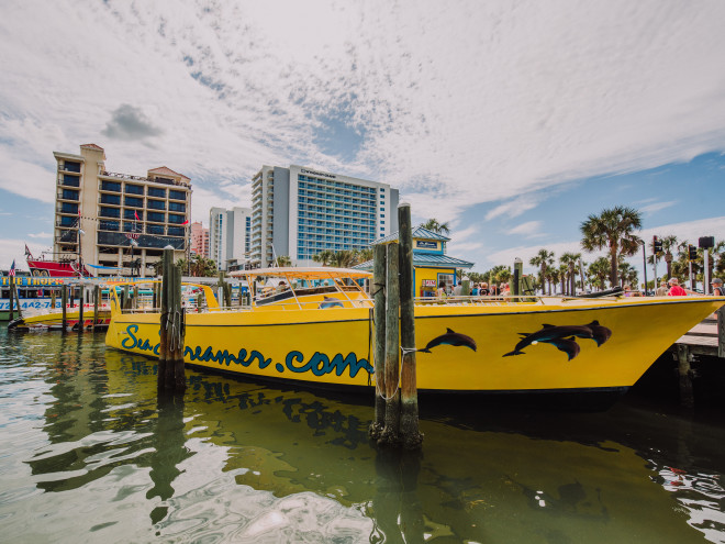 Yellow boat, the Sea Screamer, docked
