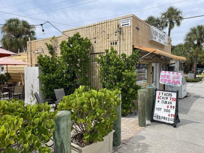 Bamboo style building with patio seating