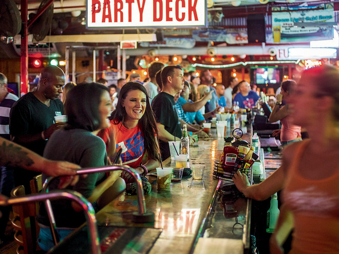 people enjoying a good time at popular Ferg's Sports Bar & Grill in St. Petersburg FL