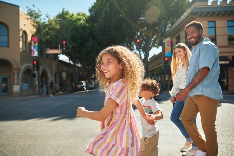 Kids and parents walking in downtown SLO