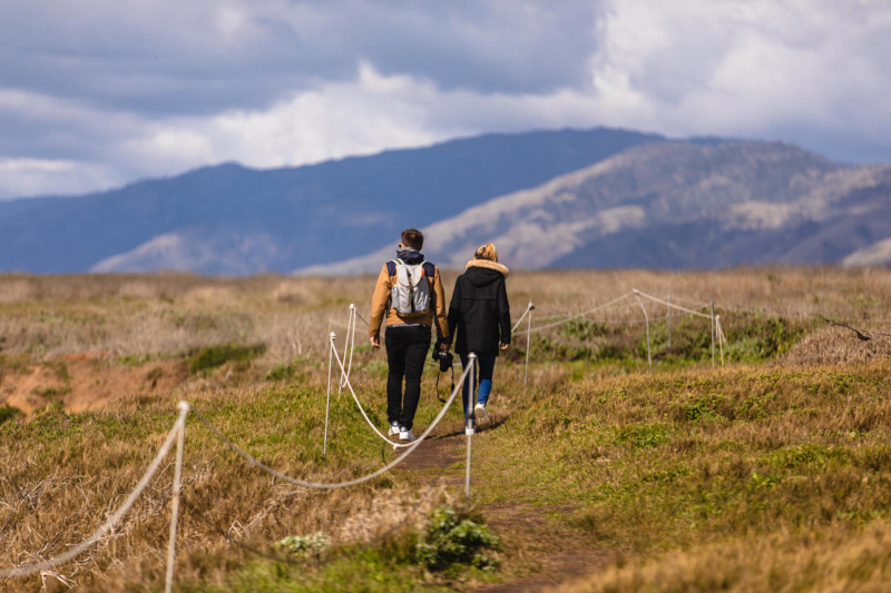 couple walking on a hiking trail