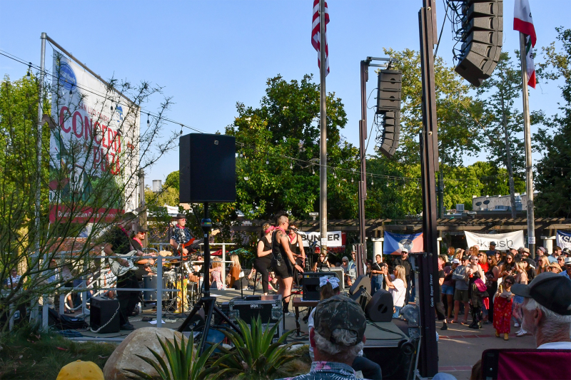 Musician playing on an outdoor stage