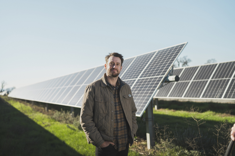 Nick Firestone of Firestone Walker in front of solar array