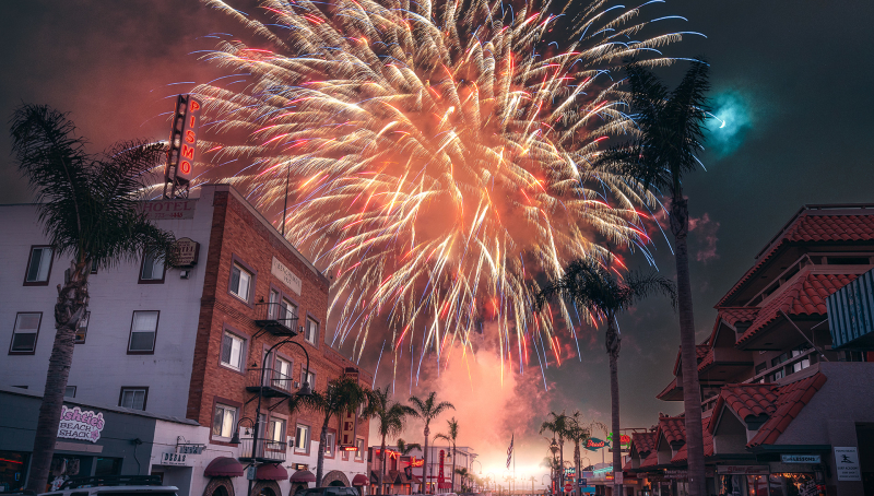 fireworks in the sky above a street in Pismo Beach