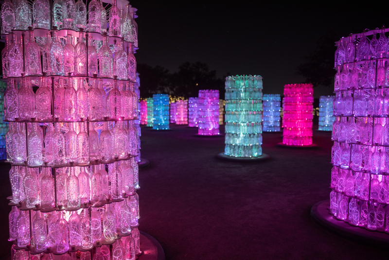 Colorful towers made of recycled wine bottles