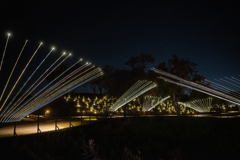 Illuminated rods and hills in the dark