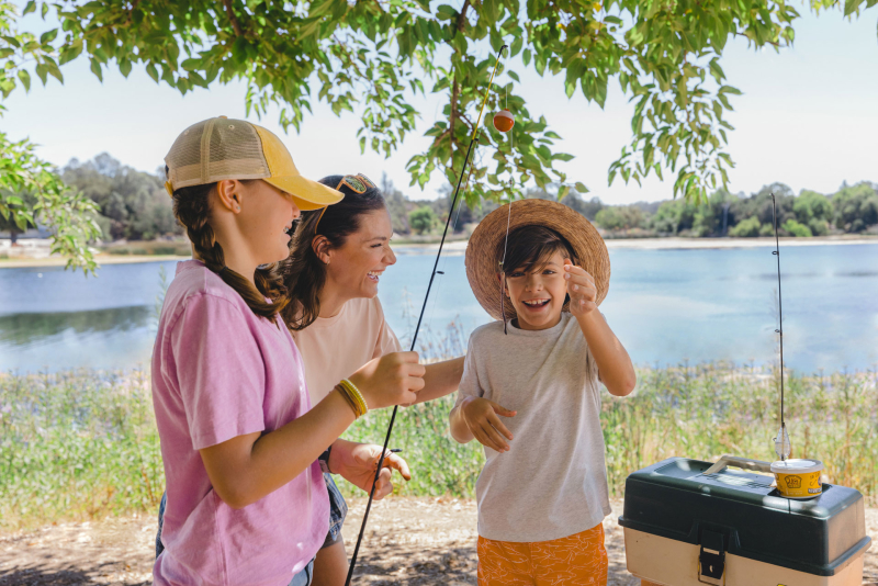 mother with children fishing at Atascadero Lake Park