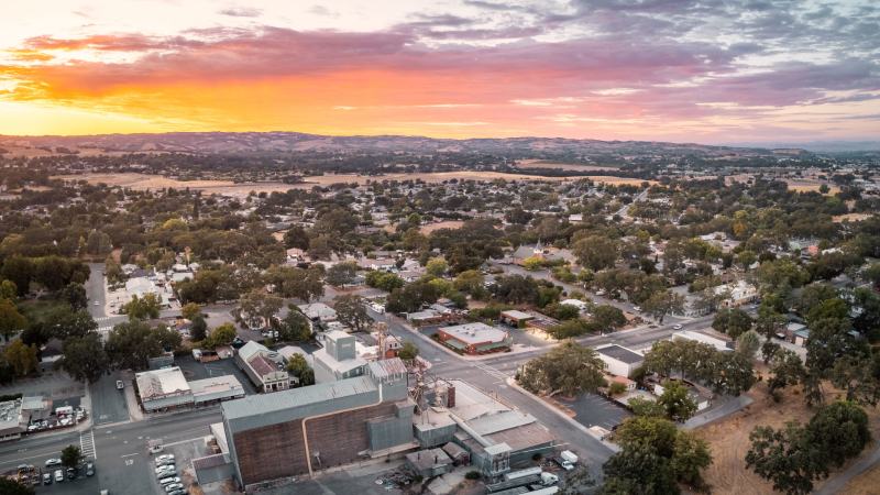 City of Templeton from a birds eye view with a colorful sunset filled sky.