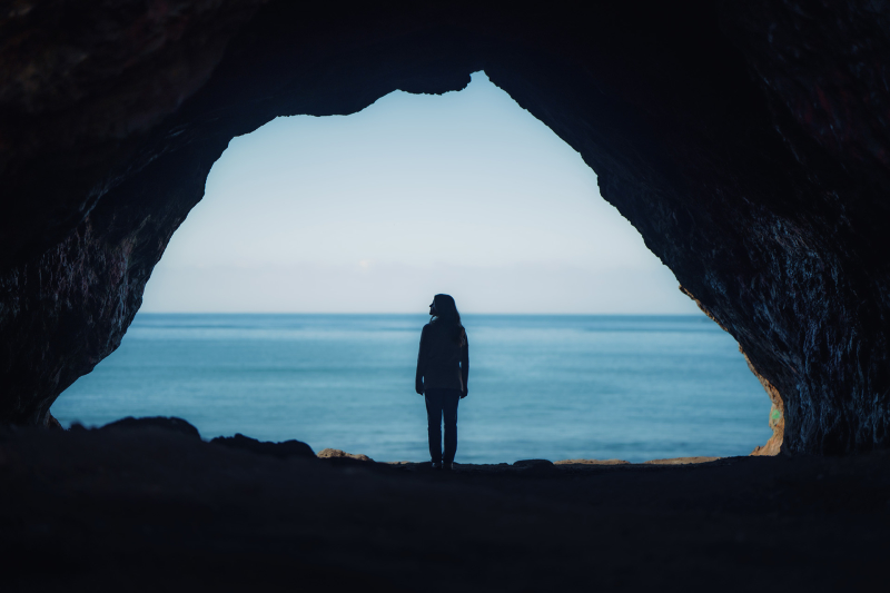 Silhouette of a girl in the Dinosaur Caves