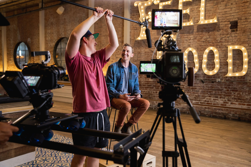 film production team setting up for an interview