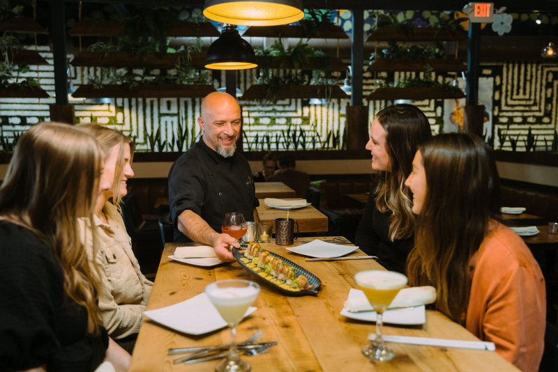 group of girls dining at Mistura
