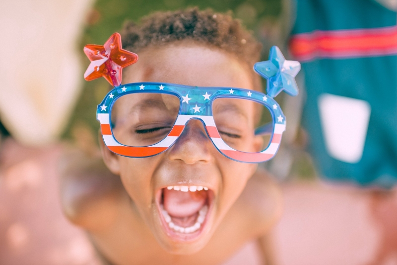 4th of July Kid with flag glasses