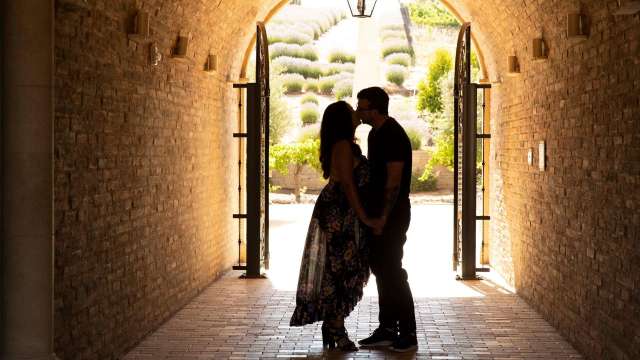 Couple in a winery tunnel