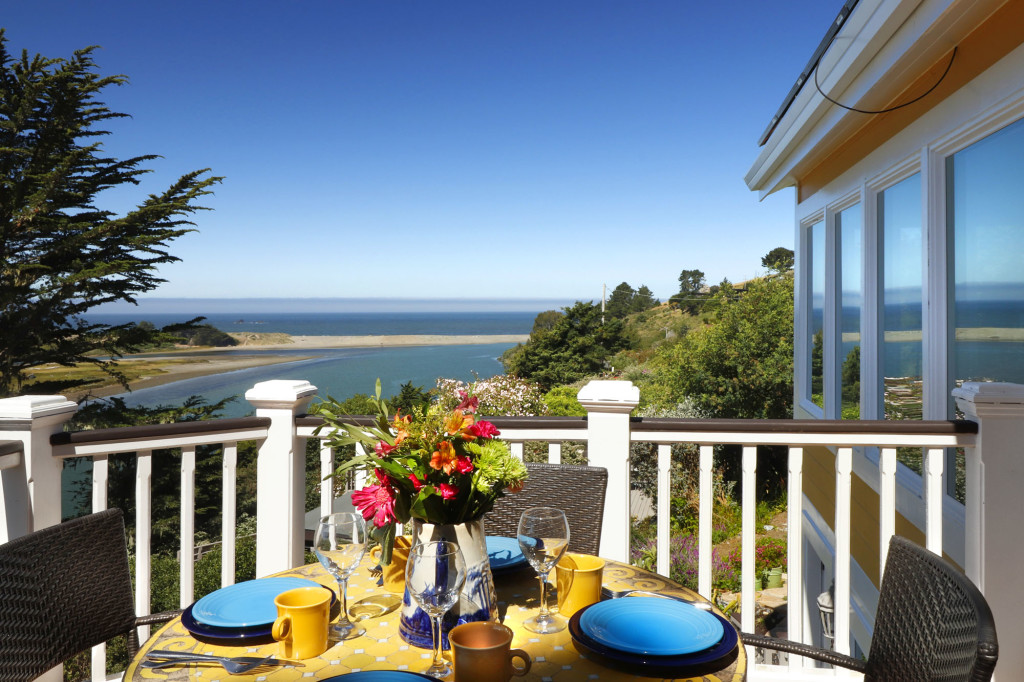 Upper deck towards ocean morning, full table set