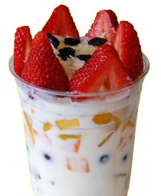 Bionico - Chilled cream poured over fresh fruit, topped with granola, coconut, raisins and strawberries