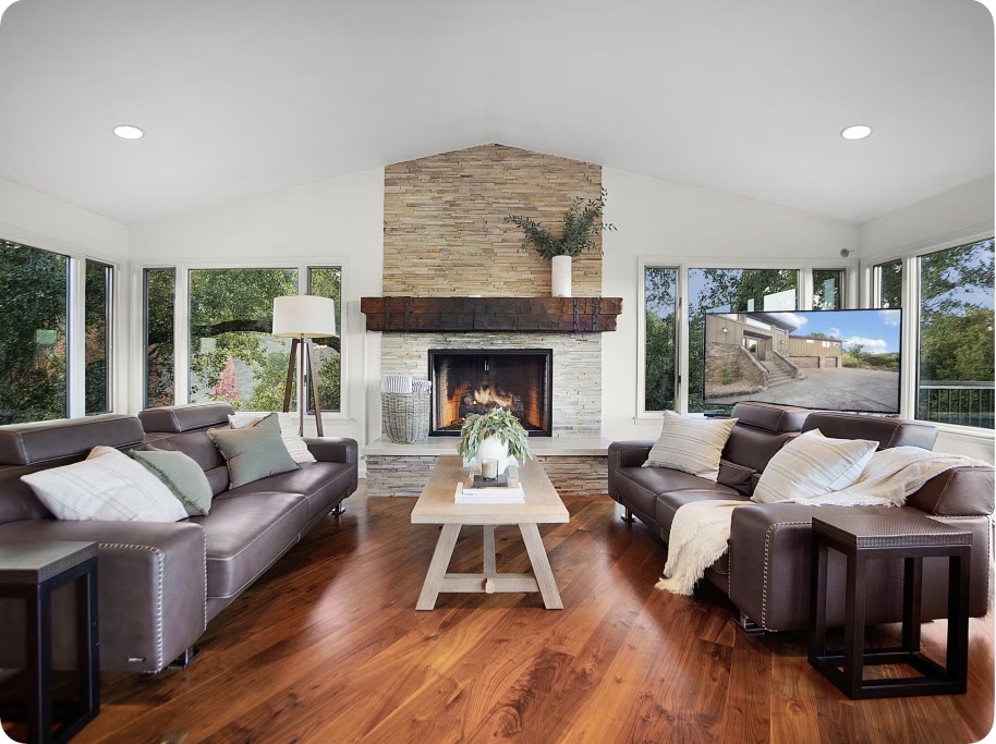 Living Room with Large Fireplace and cozy leather couches