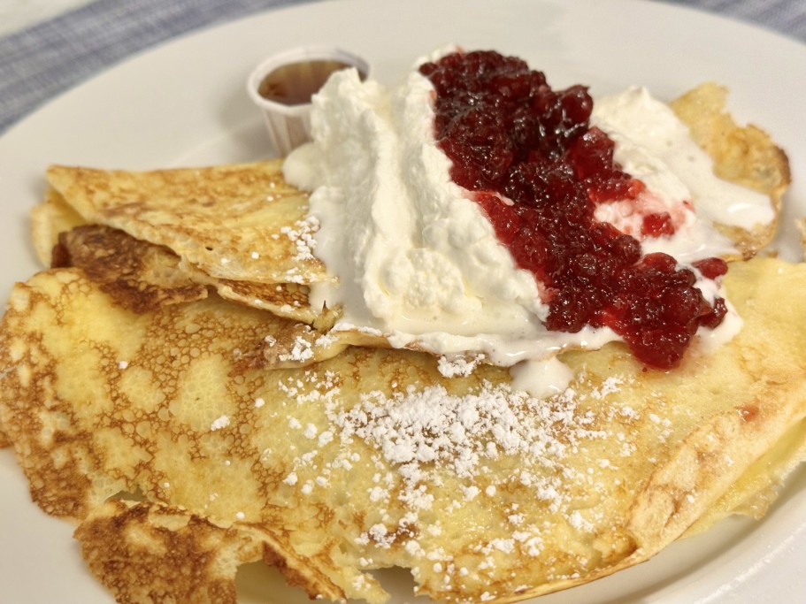 Pancakes from the North - Thin Swedish pancakes, lingonberries and vanilla cream, side of maple syrup and butter