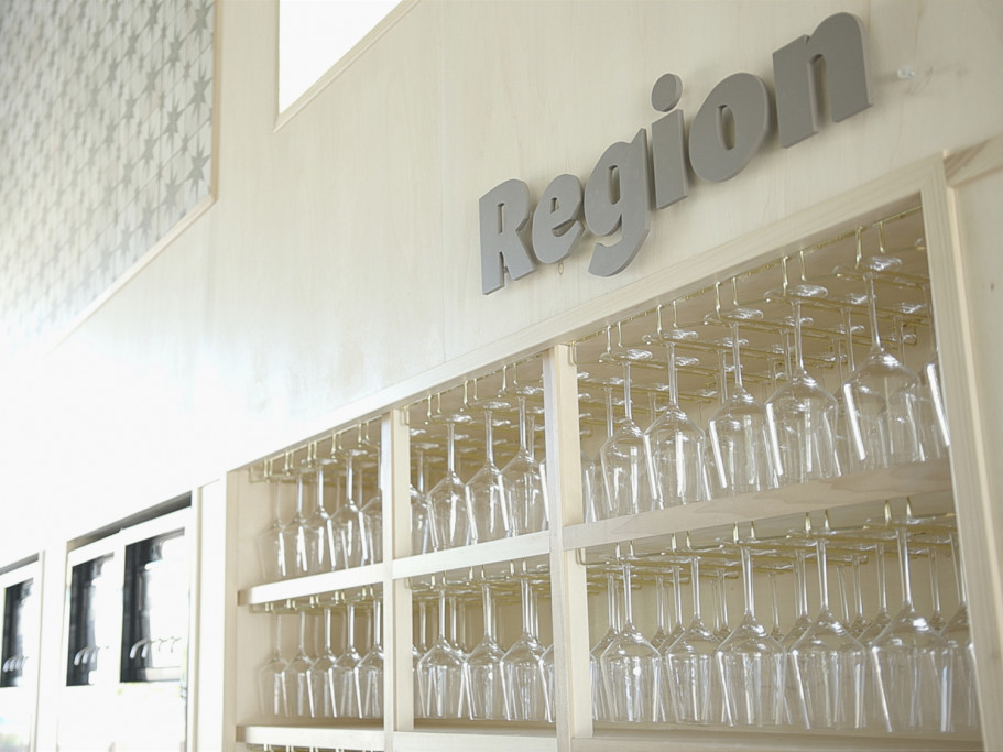 Region - logo on wall