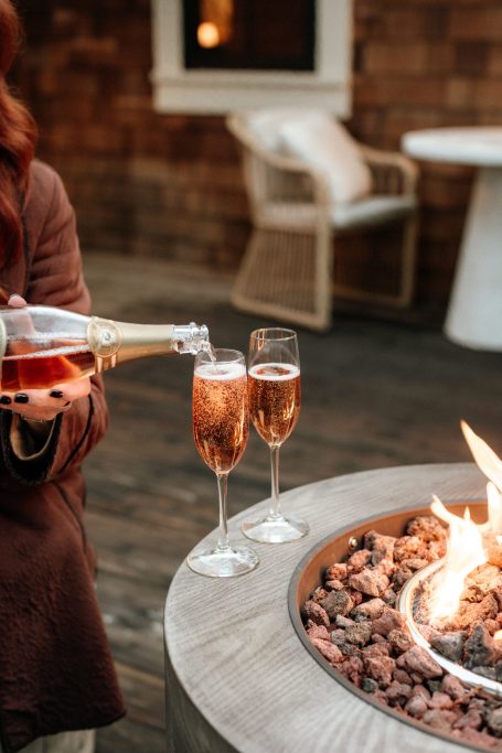 Champagne by the fire at The Lodge