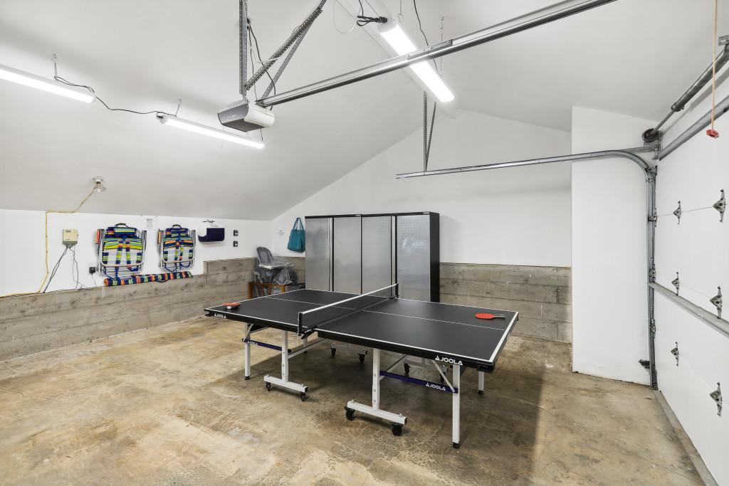 Two car garage with a ping pong table for your entertainment