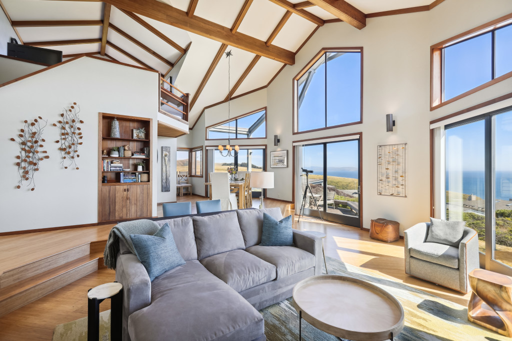 Panoramic ocean views from the floor-to-ceiling windows in the back of the house.