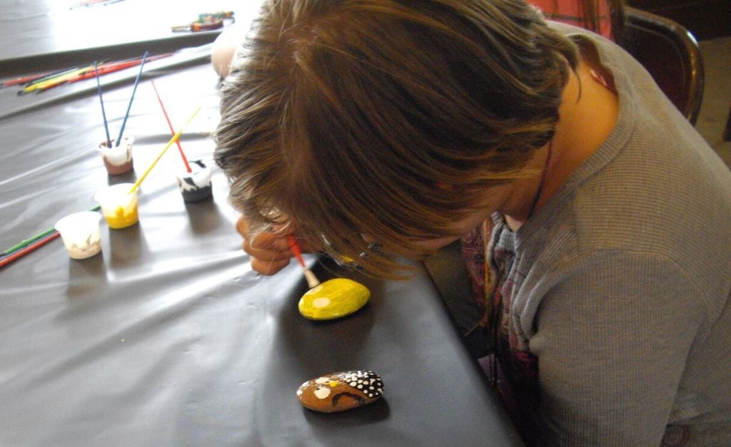 Rock painting is a favorite activity with the campers.