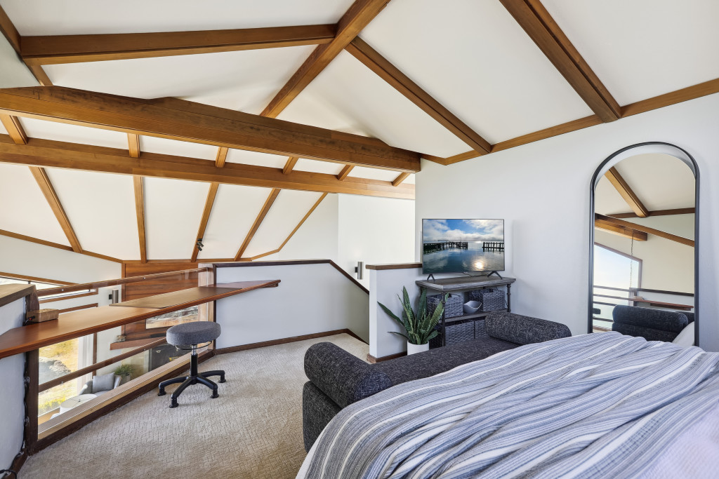 The loft has a built-in desk with the best view in the house, and a 43