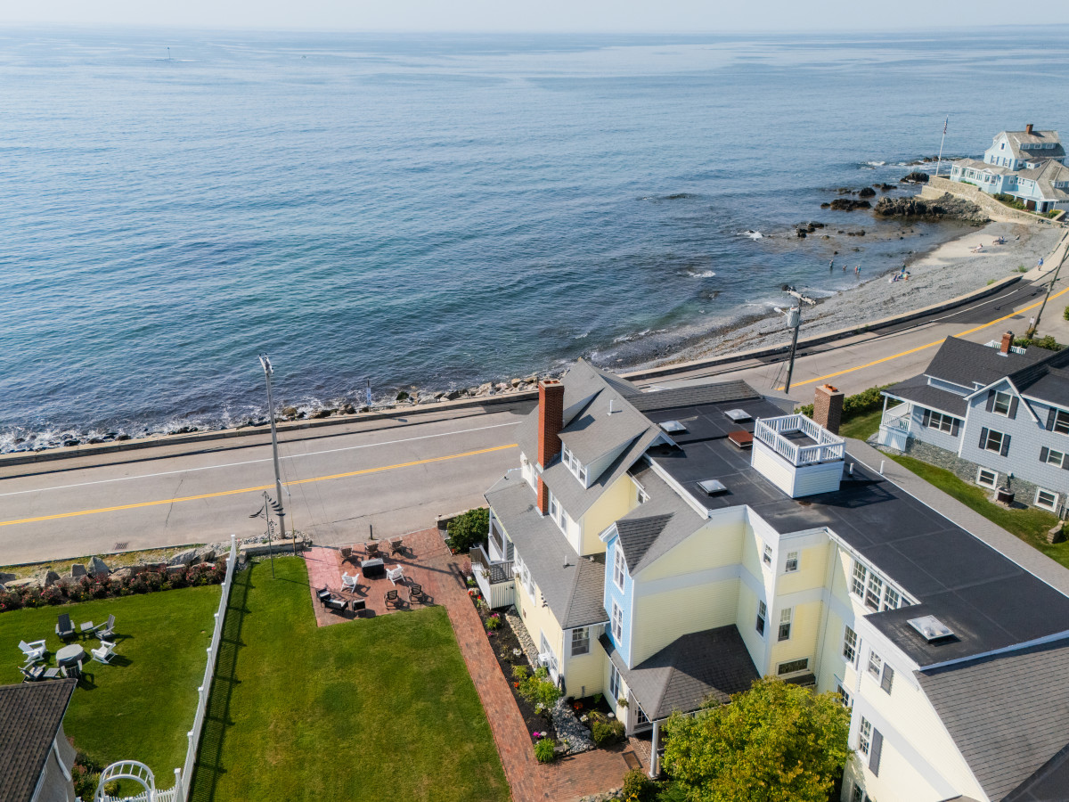 The exterior of the Beach House Inn overlooking the ocean.