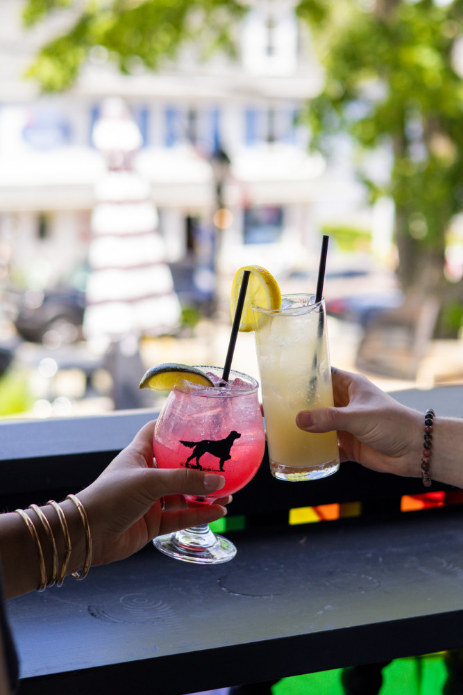 Enjoy craft cocktails on our patios at Wells & Kennebunk!