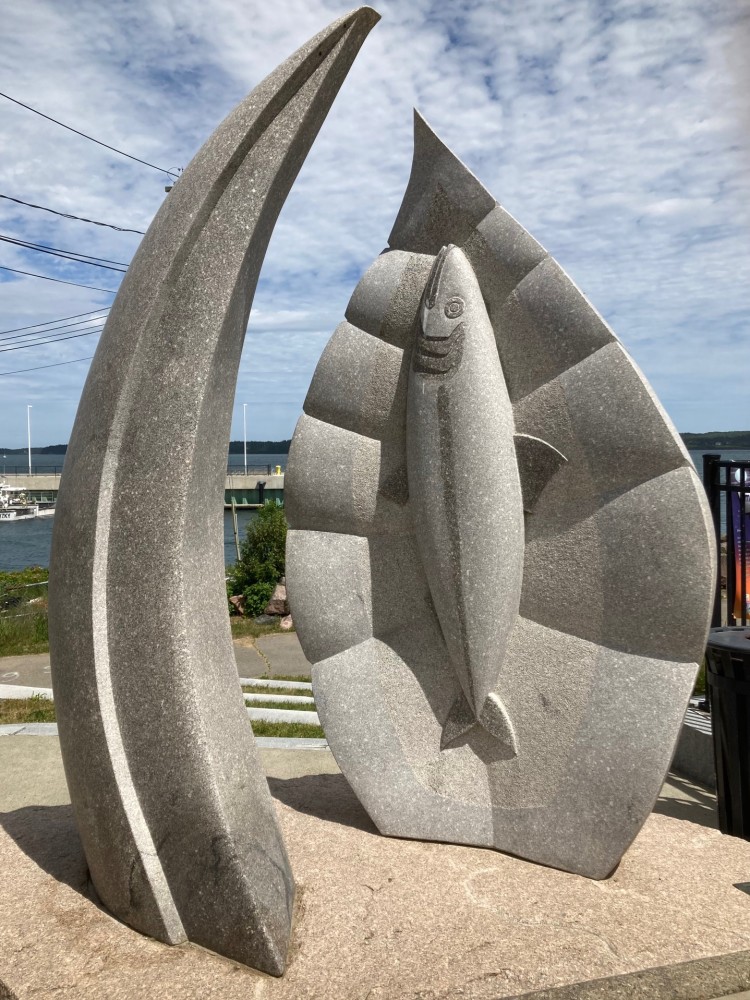 This is Eastport’s Sculpture from the 2011 Schoodic International Sculpture Symposium
The artist is Jim Boyd from Hampton, New Brunswick.  The name is Nature’s Graces.  Jim made the sculpture from Jonesboro Granite and was created in Prospect Harbor on a baseball field.