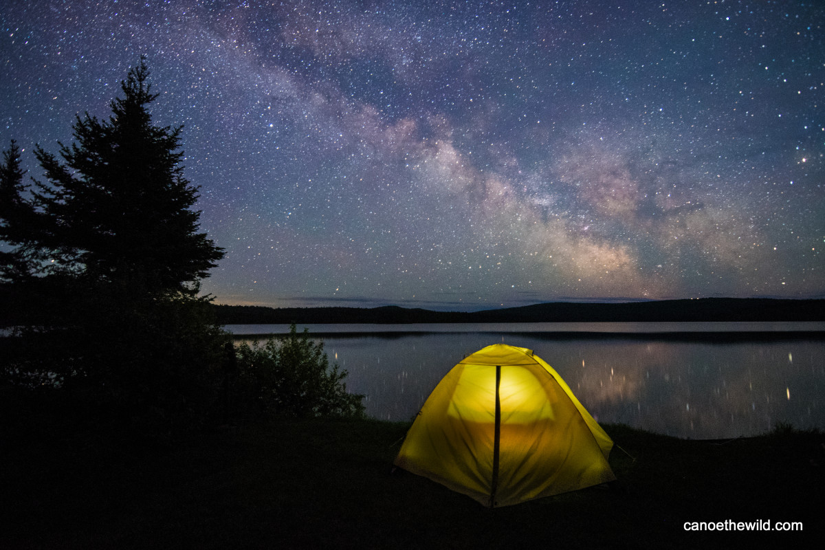 Tenting out under the Milky Way while on a multi day guided canoe tour with Canoe the Wild